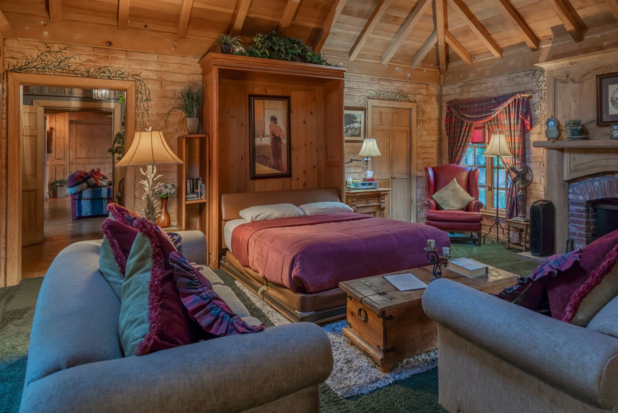 The cottage bedroom and sitting area at The Enchanted Manor
