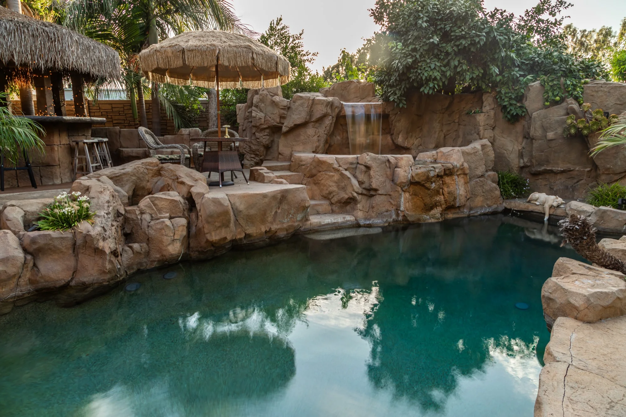 The rock grotto pool and its waterfalls at The Enchanted Manor, photographed by ConneryFilm