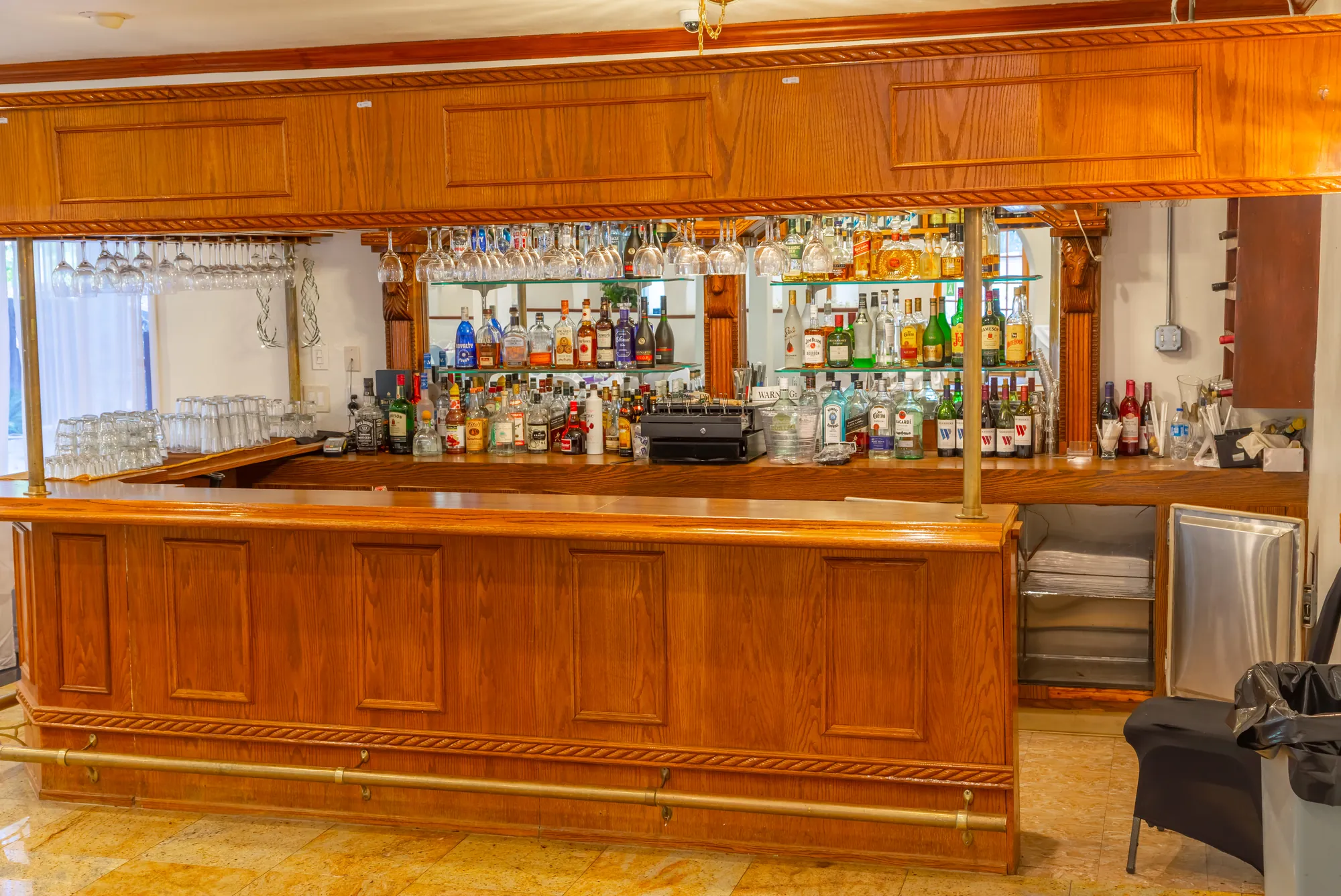 The carved oak bar in the banquet room at Kelly's Wedding Garden