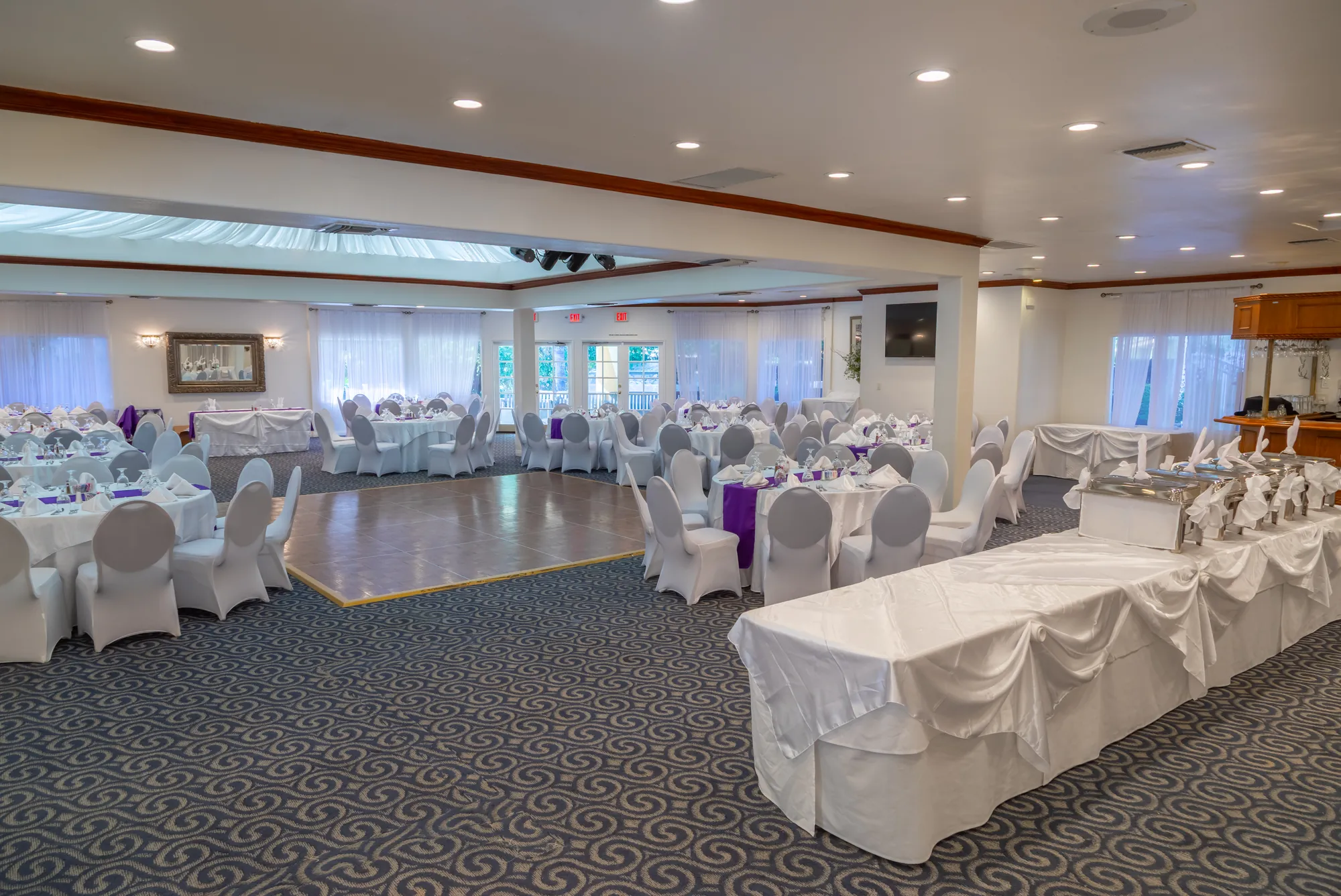 The banquet room seen from the buffet end, set for an event at Kelly's Wedding Garden