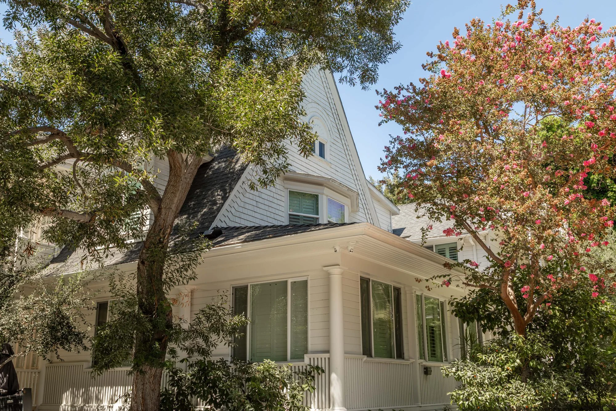 Looking up at Lombardi House through the trees