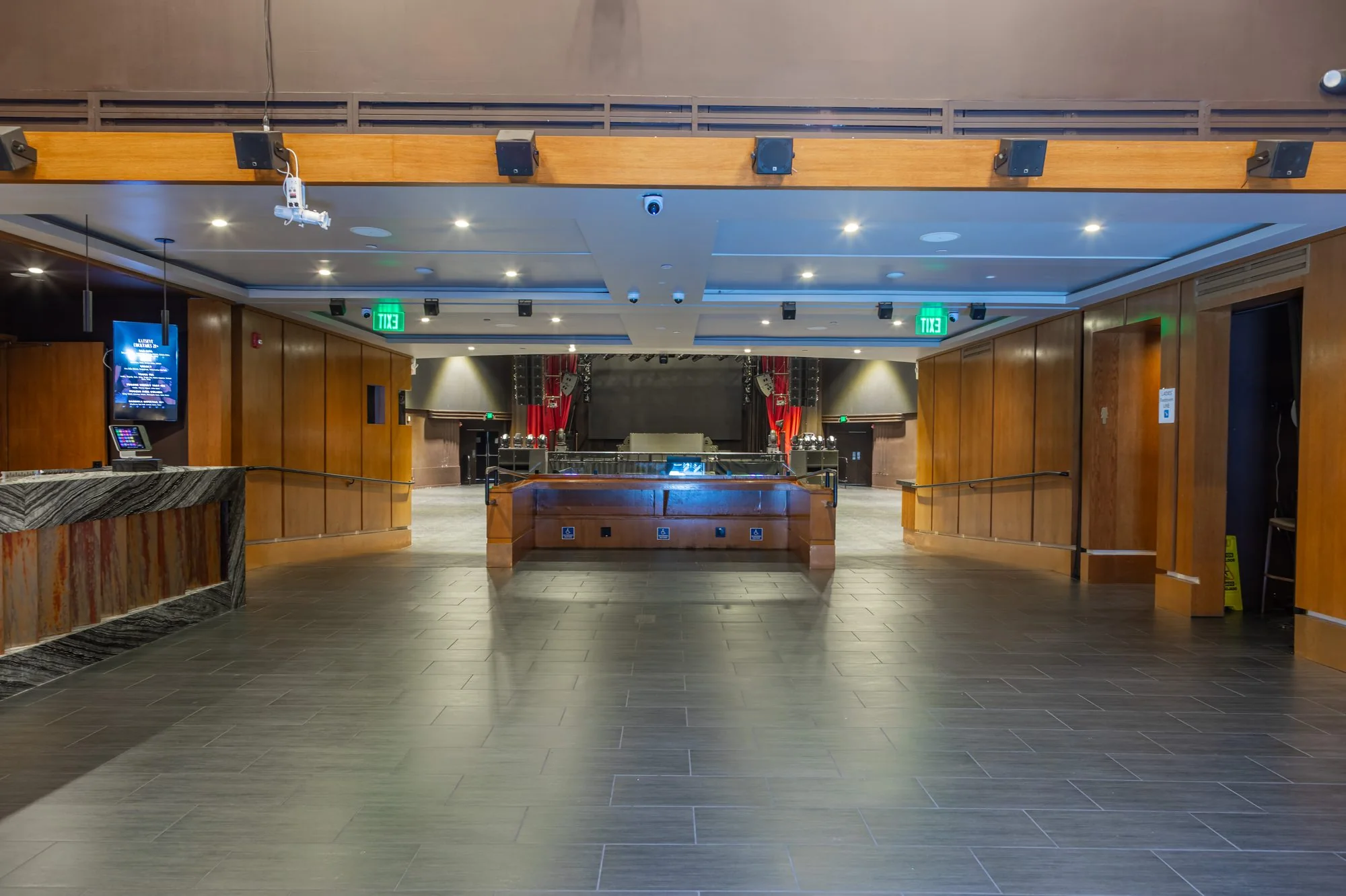 The lobby at The Vermont Hollywood, timber walls and the doors through to the floor
