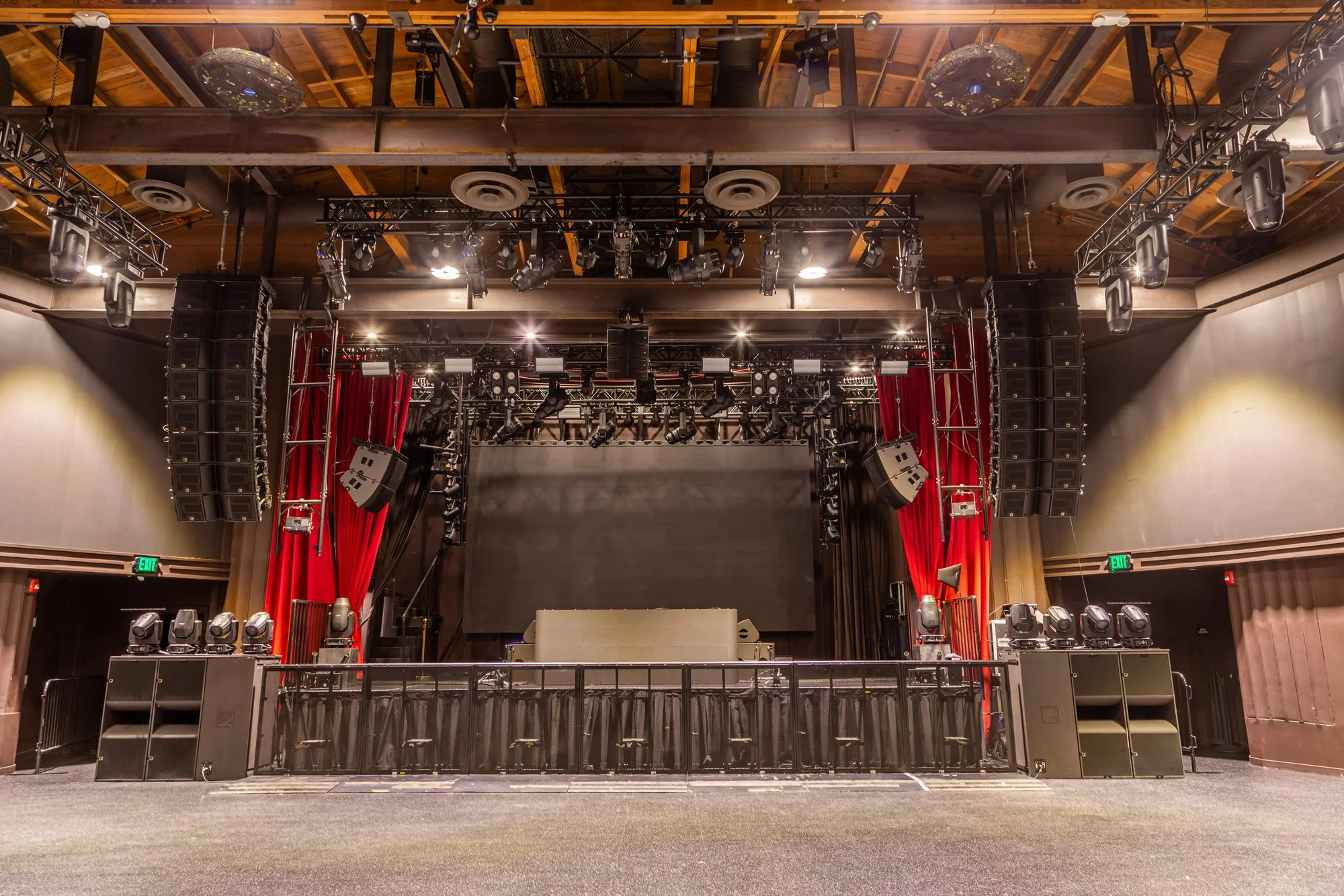 The stage at The Vermont Hollywood with its red drapes