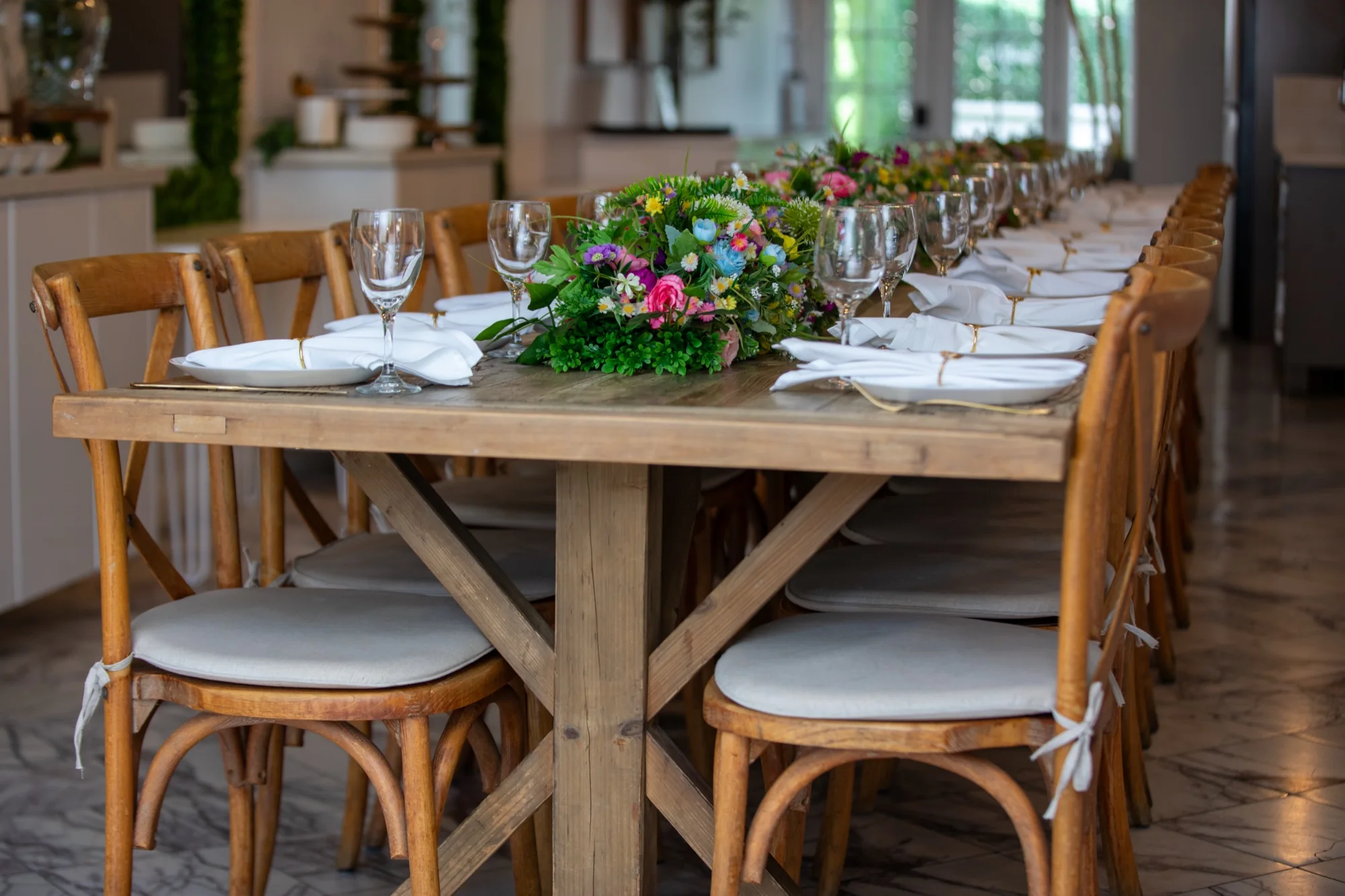 The farmhouse table and crossback chairs at Violet Cactus Petite