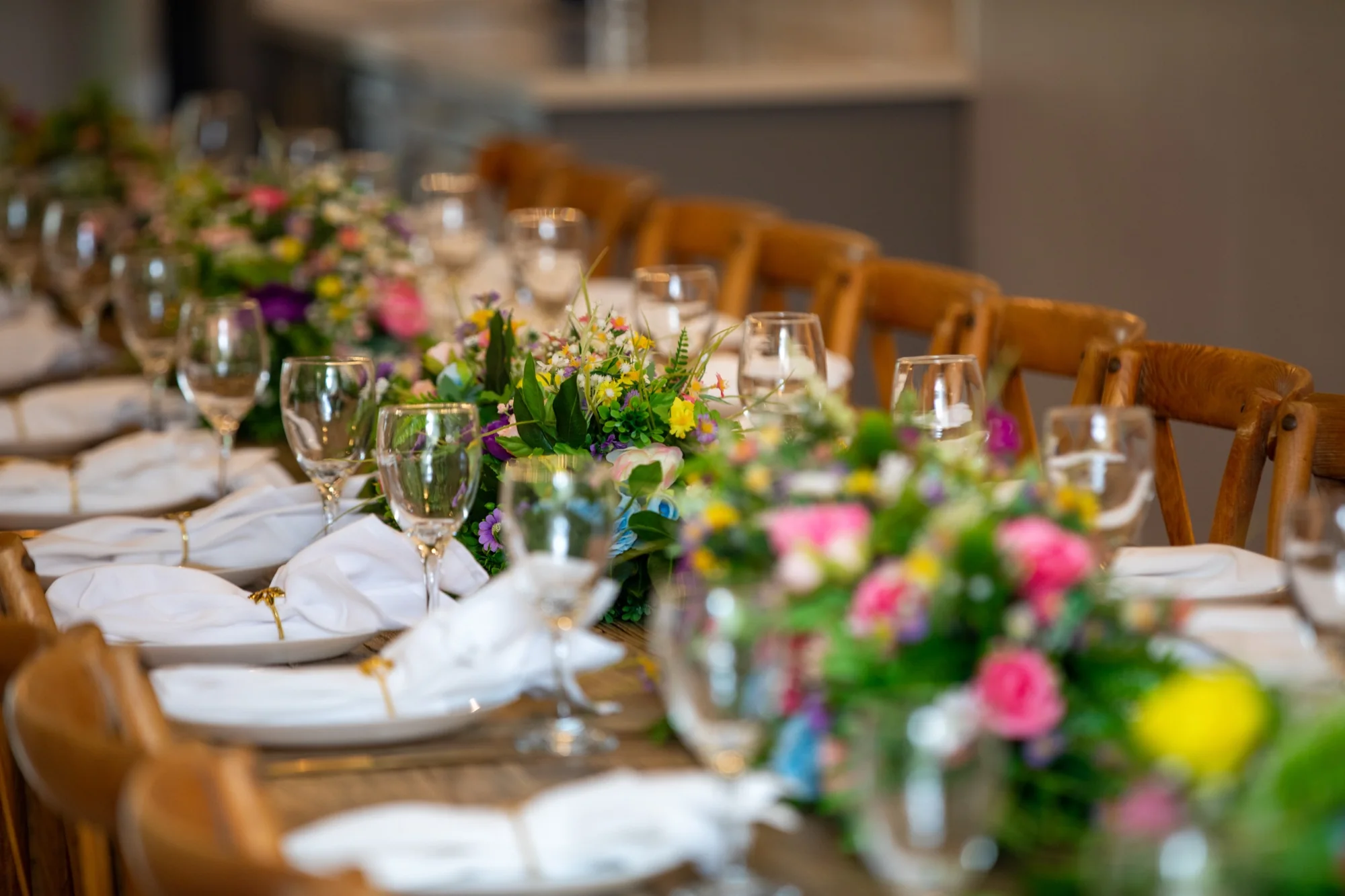 Glassware and flowers on the table at Violet Cactus Petite