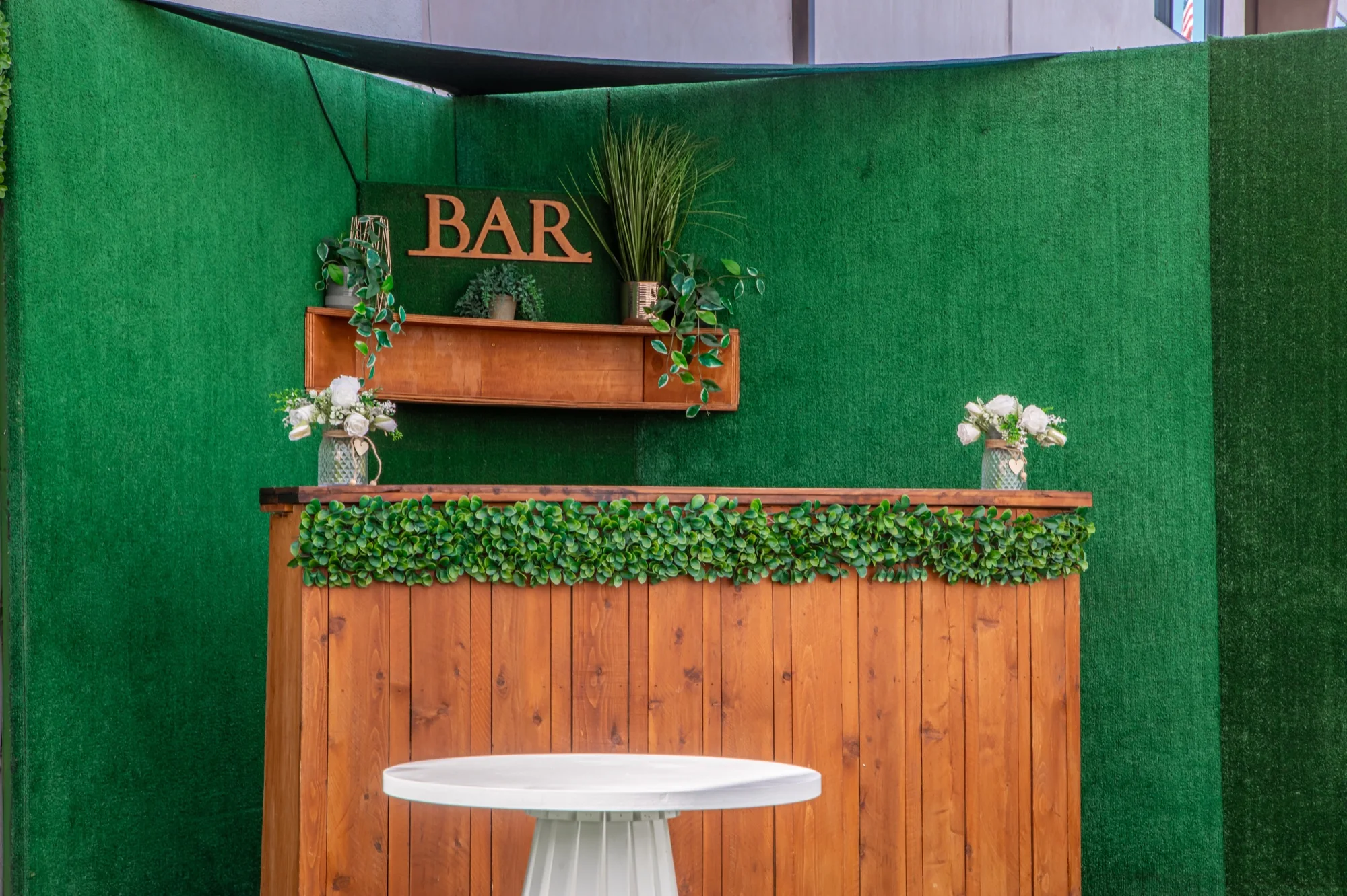 The bar wall on the patio at Violet Cactus Studio