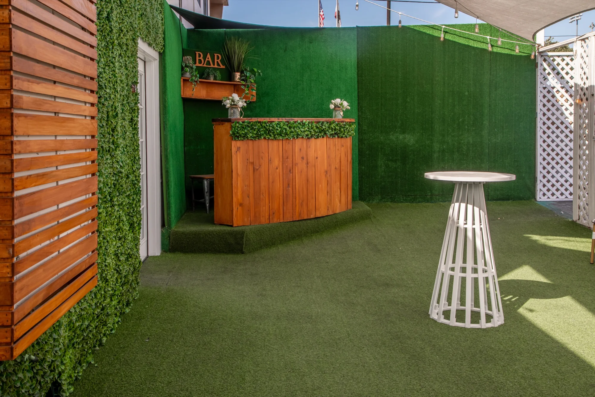 Cocktail tables on the turf at Violet Cactus Studio
